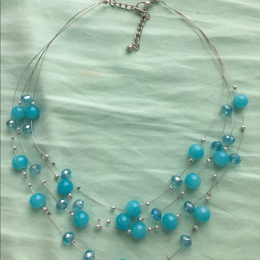 silver and blue necklace